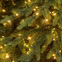 Albero Deluxe in finto pino 225 cm, 3850 miniled integrati bianco caldo