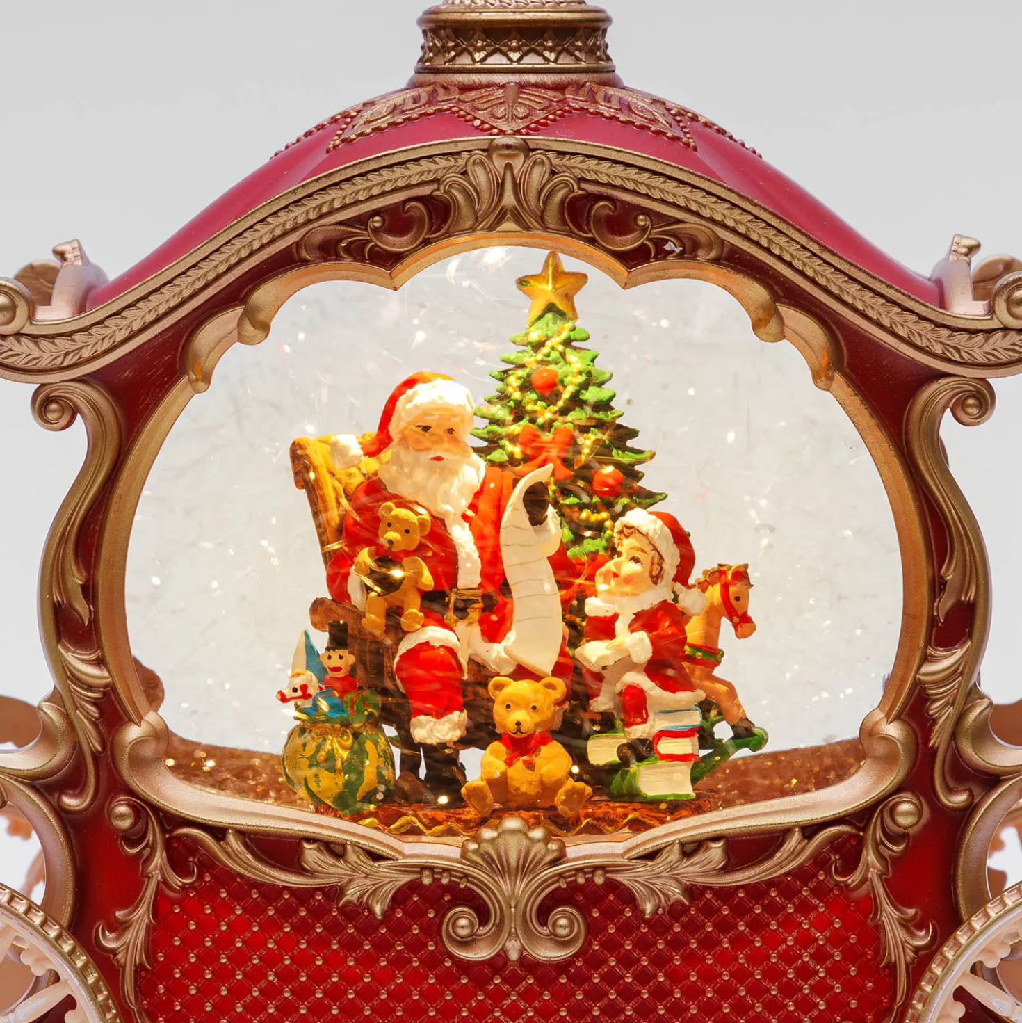 Carrozza Rosso e Oro, glitter scintillanti, h 22 cm, led bianco caldo, musiche natalizie