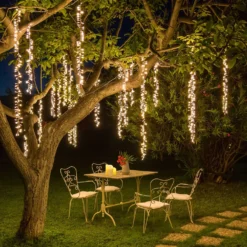 Cascata di luci Connect+ 3 nastri, 300 led bianco caldo, cavo trasparente, prolungabile