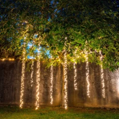 Cascata di luci Connect+ 3 nastri, 600 led bianco caldo, cavo verde, prolungabile