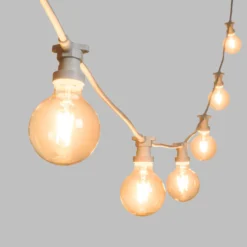 Catena 5 m, 8 lampadine led globo Ø 95 mm di 4 watt, dimmerabili, cavo bianco, prolungabile
