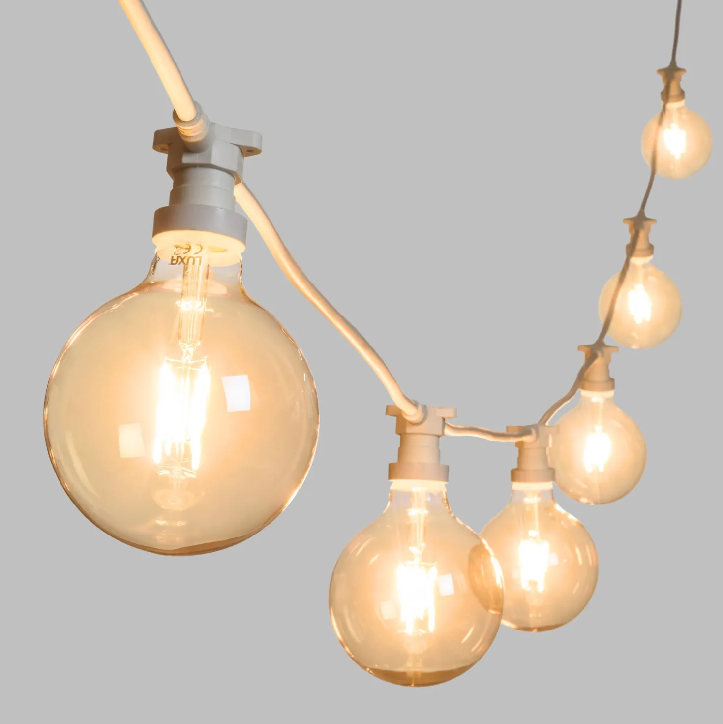 Catena 5 m, 8 lampadine led globo Ø 125 mm di 8 Watt dimmerabili, cavo bianco, prolungabile