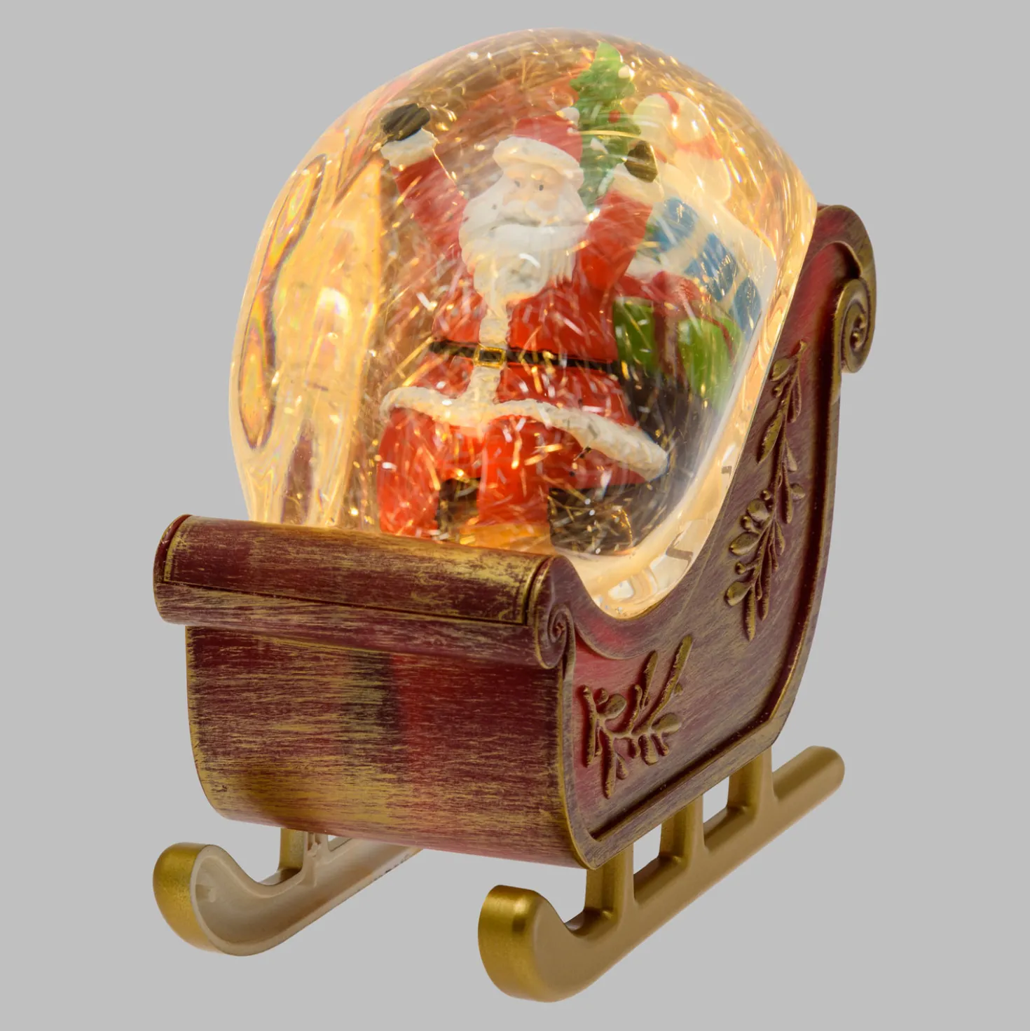 Slitta decorata con Babbo Natale a batteria con glitter nell'acqua