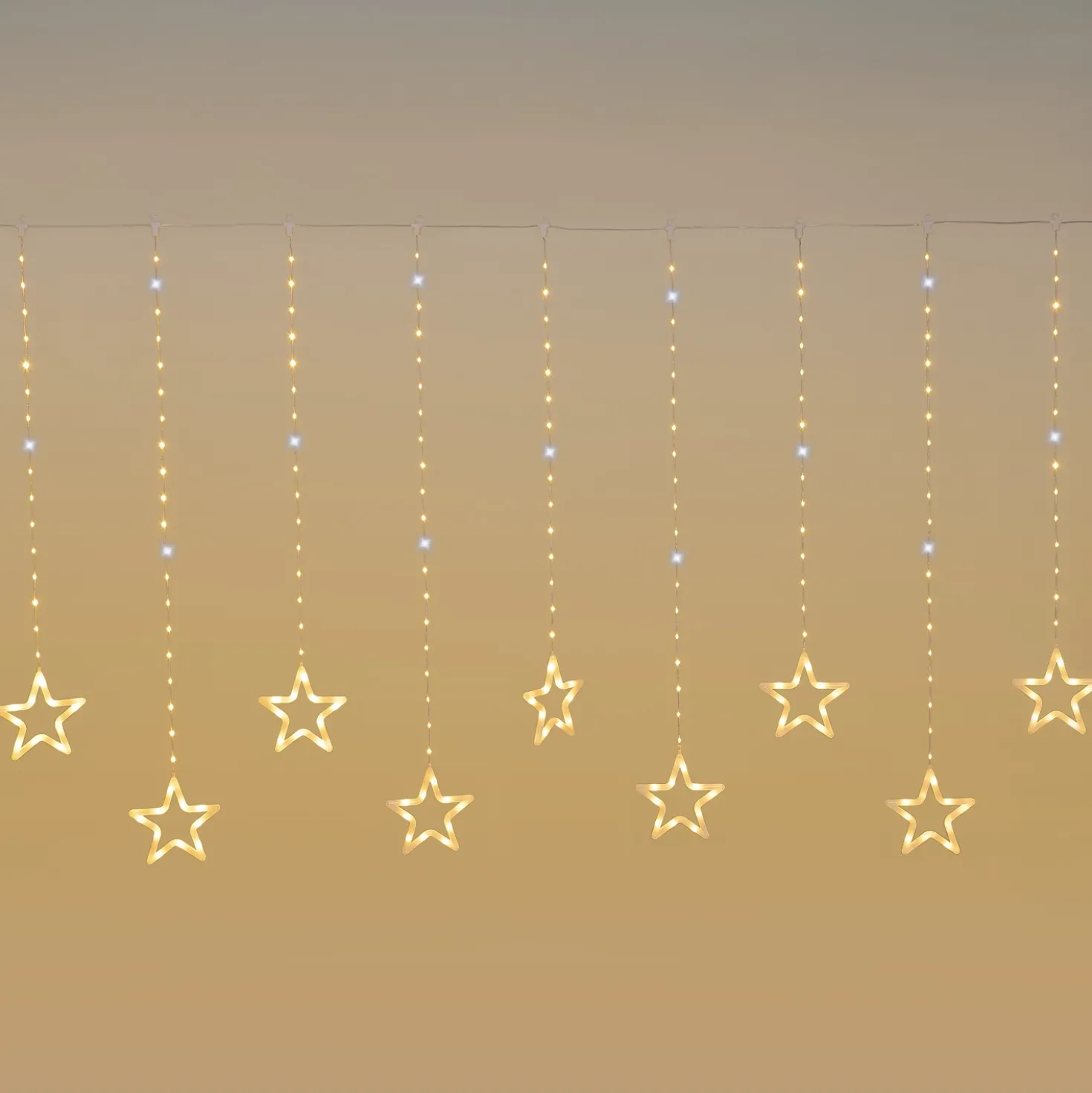 Stalattite con 14 stelle, 3,25 x h 1,15 m, 392 Gocce di Luce, led bianco caldo e bianco freddo, cavo trasparente