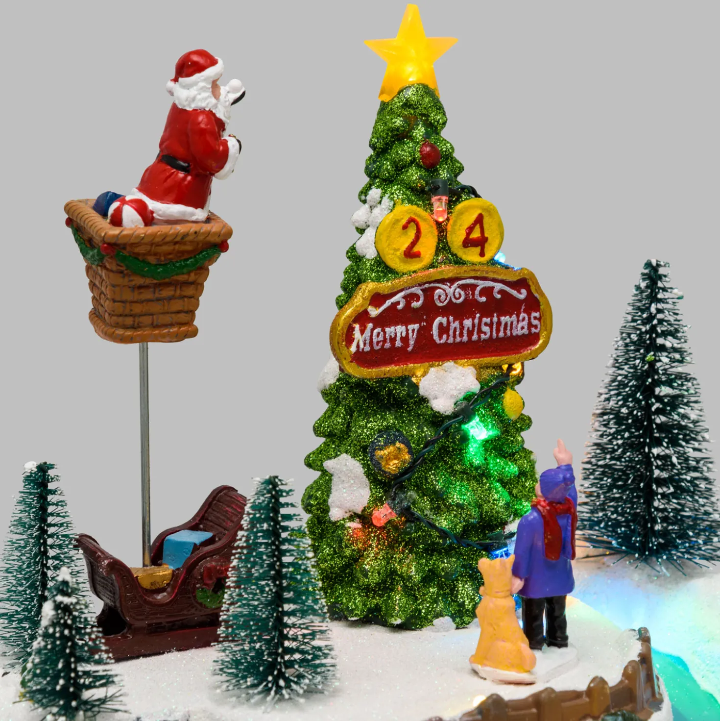 Villaggio di Natale, Albero e Babbo che lo decora in movimento, h 22 cm