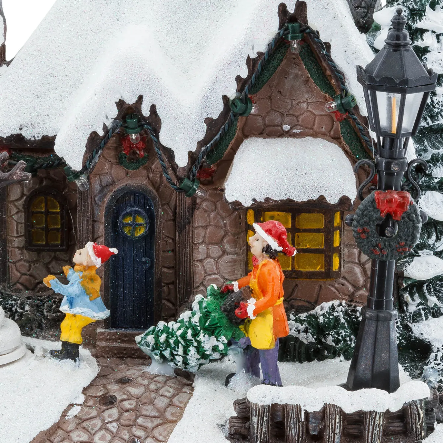 Villaggio di Natale, Casa innevata nel Bosco con Pupazzo di Neve rotante, h 20 cm, musiche natalizie