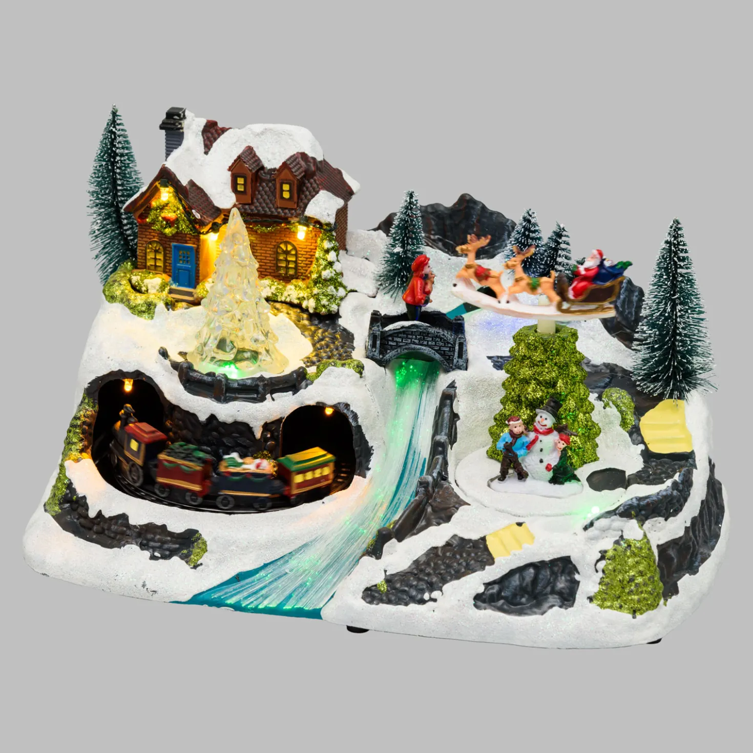 Villaggio di Natale con Paesaggio Innevato, Trenino e Babbo su Slitta rotanti, Ruscello fibre ottiche, h 18 cm, musiche natalizie