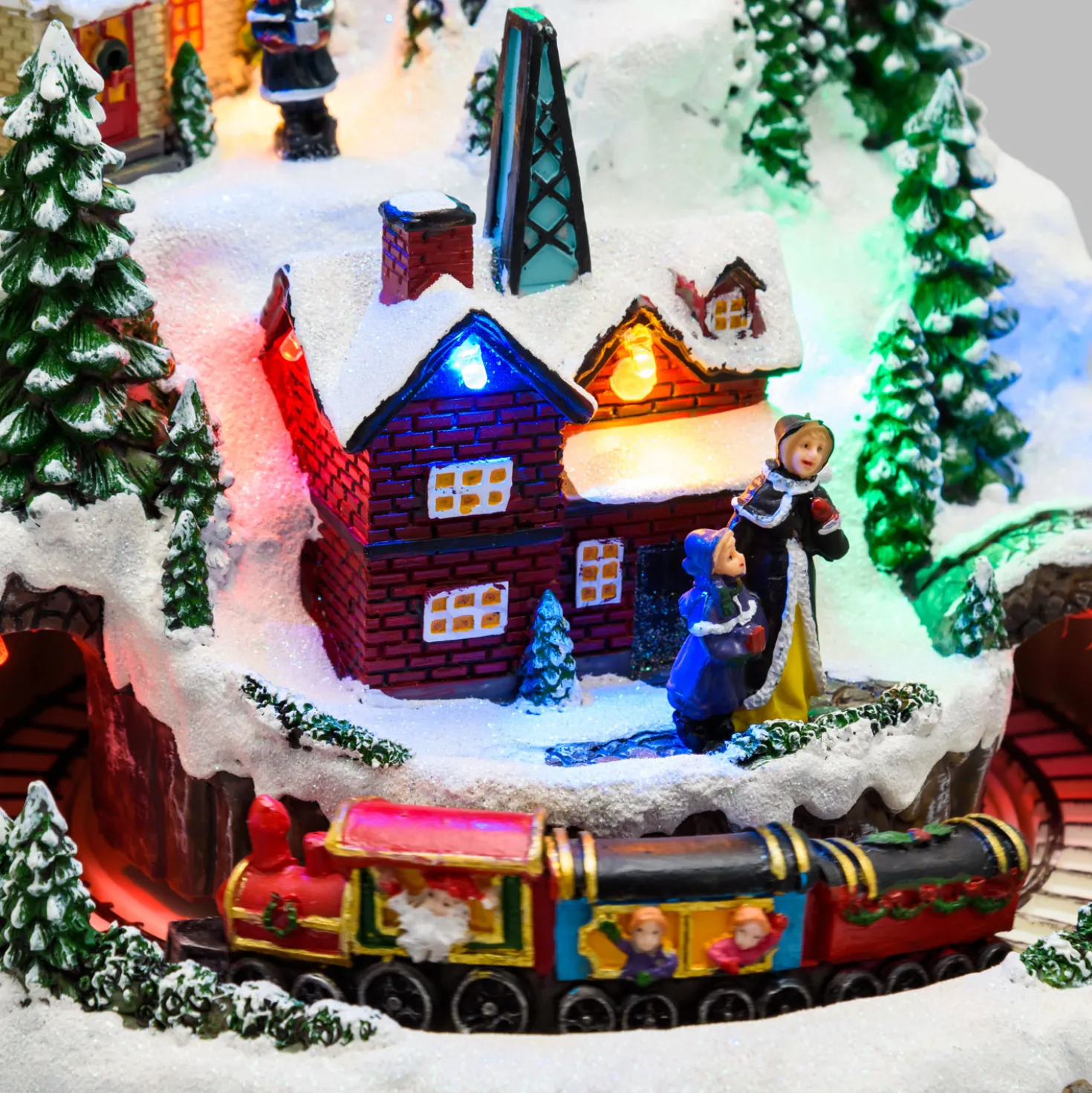 Villaggio innevato di Natale e Trenino con movimento rotante, h 22 cm, musiche natalizie